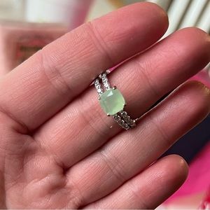 Size 9. Double ring. Lab created mint green opal on rhodium plating. SRP $124